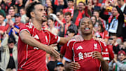 Curtis Jones (left) making sure the Anfield crowd acknowledged Rio Ngumoha’s performance.