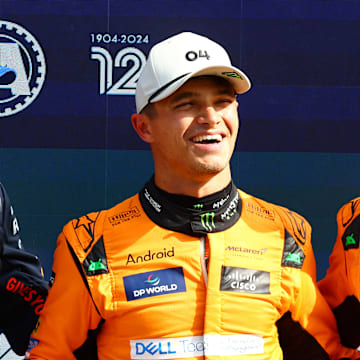 Second placed qualifier Max Verstappen of the Netherlands and Oracle Red Bull Racing, pole position qualifier Lando Norris of Great Britain and McLaren and third placed qualifier Oscar Piastri of Australia and McLaren react in parc ferme after qualifying ahead of the F1 Grand Prix of Netherlands at Circuit Zandvoort on August 24, 2024 in Zandvoort, Netherlands.