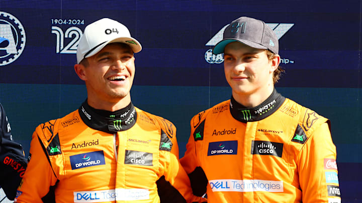 Second placed qualifier Max Verstappen of the Netherlands and Oracle Red Bull Racing, pole position qualifier Lando Norris of Great Britain and McLaren and third placed qualifier Oscar Piastri of Australia and McLaren react in parc ferme after qualifying ahead of the F1 Grand Prix of Netherlands at Circuit Zandvoort on August 24, 2024 in Zandvoort, Netherlands.