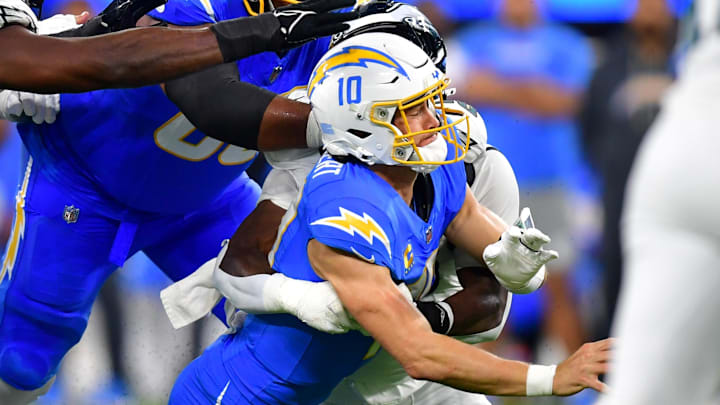 Chargers quarterback Justin Herbert was sacked a career-high seven times. Chargers quarterback Justin Herbert was sacked a career-high seven times.