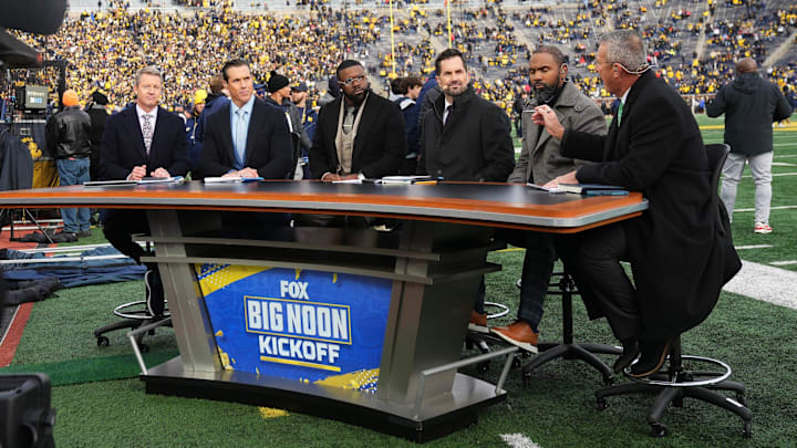 Nov 25, 2023; Ann Arbor, Michigan, USA; Former Ohio State head coach Urban Meyer talks on the sideline set of Fox Big Noon Kickoff prior to the NCAA football game between the Michigan Wolverines and the Ohio State Buckeyes at Michigan Stadium.