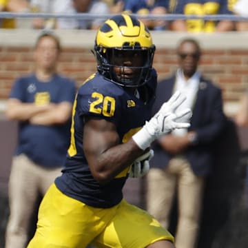 Sep 14, 2024; Ann Arbor, Michigan, USA; Michigan Wolverines running back Kalel Mullings (20) rushes second half against the Arkansas State Red Wolves at Michigan Stadium.