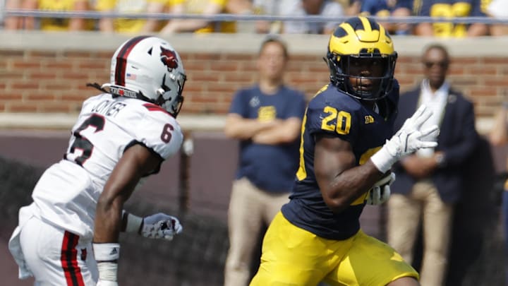 Sep 14, 2024; Ann Arbor, Michigan, USA; Michigan Wolverines running back Kalel Mullings (20) rushes second half against the Arkansas State Red Wolves at Michigan Stadium.