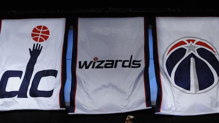 May 10, 2011; Washington, DC, USA; Banners with the new Washington Wizards colors and logos are unfurled during the unveiling of the new uniforms and logos at the Verizon Center.  Mandatory Credit: Rafael Suanes-Imagn Images