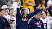 Nov 28, 2025; Tempe, Arizona, USA; Arizona Wildcats head coach Brent Brennan celebrates against the Arizona State Sun Devils in the second half during the 99th Territorial Cup at Mountain America Stadium. Mandatory Credit: Mark J. Rebilas-Imagn Images