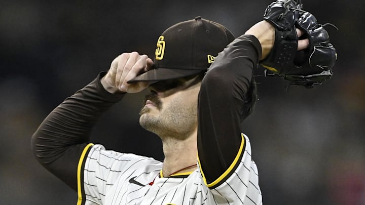 Oct 9, 2024; San Diego, California, USA; San Diego Padres pitcher Dylan Cease (84) reacts after a hit in the second inning against the Los Angeles Dodgers during game four of the NLDS for the 2024 MLB Playoffs at Petco Park.  Mandatory Credit: Denis Poroy-Imagn Images