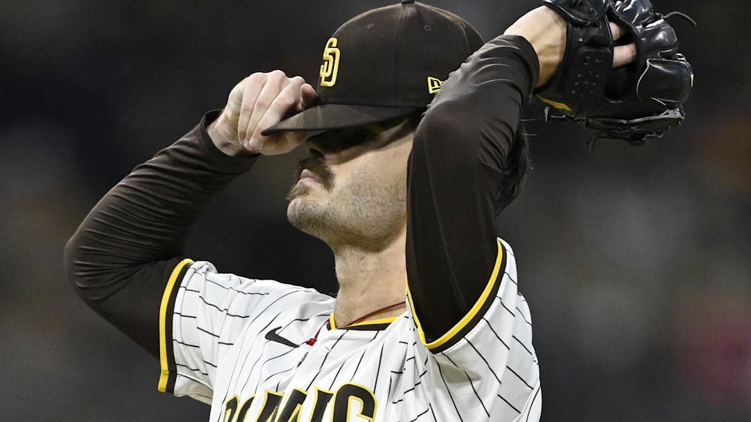 Oct 9, 2024; San Diego, California, USA; San Diego Padres pitcher Dylan Cease (84) reacts after a hit in the second inning against the Los Angeles Dodgers during game four of the NLDS for the 2024 MLB Playoffs at Petco Park.  Mandatory Credit: Denis Poroy-Imagn Images
