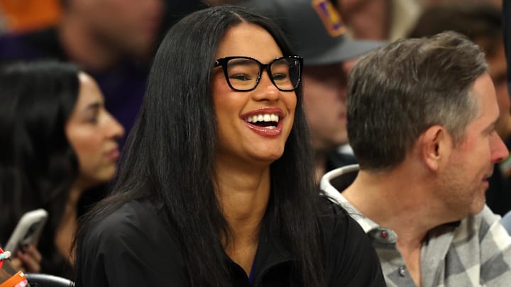 Nov 6, 2025; Phoenix, Arizona, USA; Phoenix Mercury forward Satou Sabally sits court side of the Phoenix Suns game against the Los Angeles Clippers at the Mortgage Matchup Center. Mandatory Credit: Mark J. Rebilas-Imagn Images
