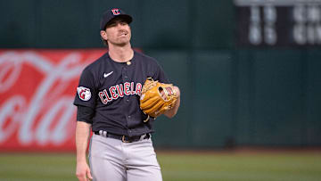 Apr 4, 2023; Oakland, California, USA; Cleveland Guardians starting pitcher Shane Bieber (57) reacts after throwing a pitch during the third inning of the game against the Oakland Athletics at RingCentral Coliseum.