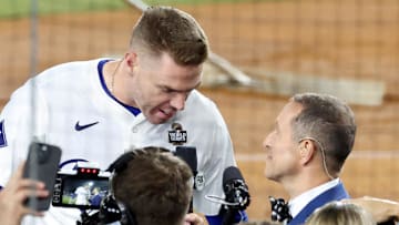 Oct 25, 2024; Los Angeles, California, USA; Fox Sports field reporter Ken Rosenthal interviews Los Angeles Dodgers first baseman Freddie Freeman (5) after the win against the New York Yankees during game one of the 2024 MLB World Series at Dodger Stadium. 