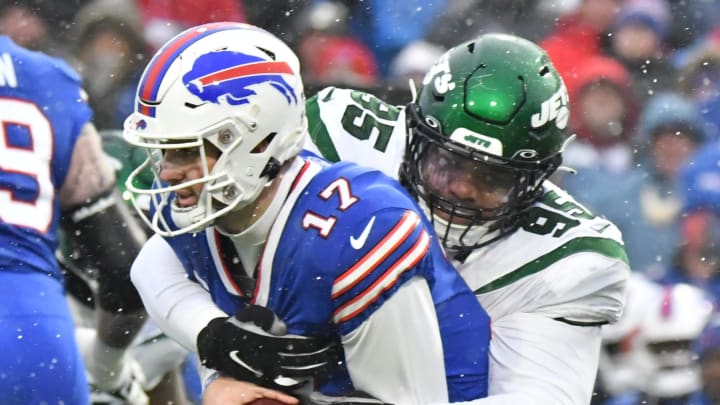 Dec 11, 2022; Orchard Park, NY; Buffalo Bills quarterback Josh Allen (17) is sacked by New York Jets defensive tackle Quinnen Williams (95) in the first quarter at Highmark Stadium. 