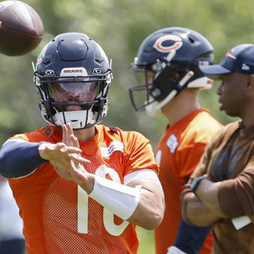 Caleb Williams takes the field Saturday for his first training camp practice happy the contract stuff is over for now.