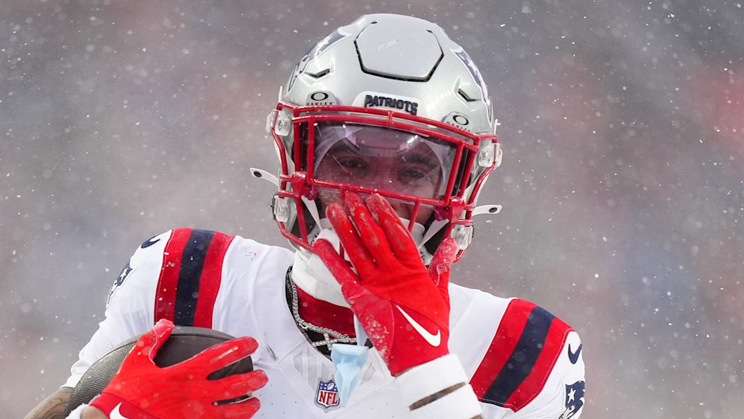 Jan 25, 2026; Denver, CO, USA; New England Patriots cornerback Christian Gonzalez (0) reacts after an interception against the Denver Broncos  during the second half in the 2026 AFC Championship Game at Empower Field at Mile High. Mandatory Credit: Ron Chenoy-Imagn Images