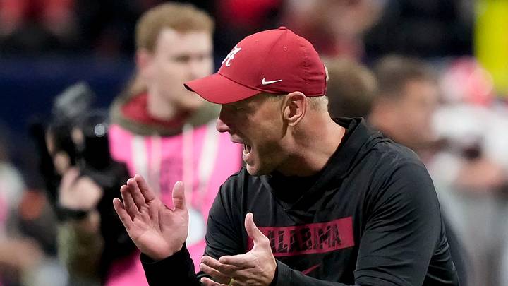 Dec 6, 2025; Atlanta, GA, USA; Alabama head coach Kalen DeBoer encourages his players as they warm up before the SEC Championship Game at Mercedes-Benz Stadium. Mandatory Credit: Gary Cosby Jr.-Tuscaloosa News