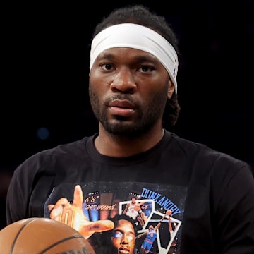 Apr 11, 2025; New York, New York, USA; New York Knicks forward Precious Achiuwa (5) warms up before a game against the Cleveland Cavaliers at Madison Square Garden. Mandatory Credit: Brad Penner-Imagn Images