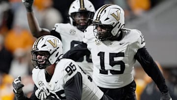 Vanderbilt defensive lineman Linus Zunk (95) celebrates after sacking Tennessee quarterback Joey Aguilar (6) during the fourth quarter at Neyland Stadium in Knoxville, Tenn., Saturday, Nov. 29, 2025.