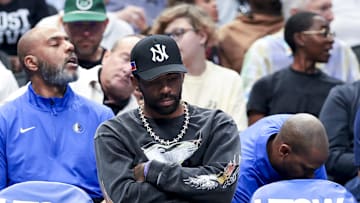 Mar 16, 2025; Mavericks guard Kyrie Irving sits on the bench against the Philadelphia 76ers at American Airlines Center. Credit: Kevin Jairaj-Imagn Images