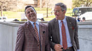 Sean Miller chats with athletic director Chris Del Conte following a press conference announcing Miller as The University of Texas' new men's basketball coach Tuesday, March 25, 2025.