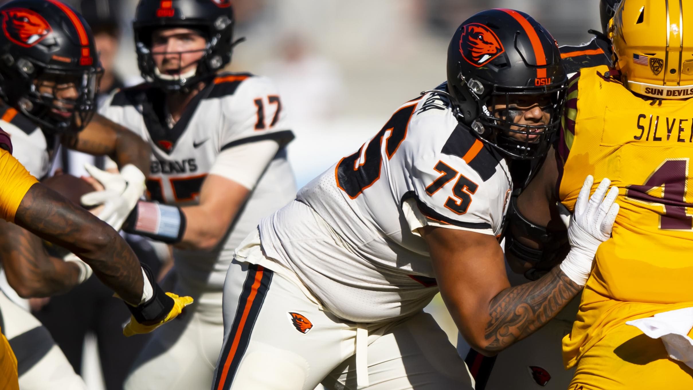  Oregon State Beavers offensive lineman Taliese Fuaga (75)  blocks against the Arizona State Sun Devils.