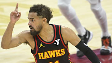 Trae Young #11 of the Atlanta Hawks reacts against the Cleveland Cavaliers.