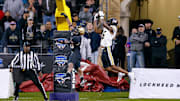 Dec 22, 2021; Fort Worth, Texas, USA; Missouri Tigers wide receiver Keke Chism (6) catches a touchdown pass with Army Black Knights defensive back Marquel Broughton (20) defending during the fourth quarter of  the 2021 Armed Forces Bowl at Amon G. Carter Stadium. Mandatory Credit: Andrew Dieb-Imagn Images