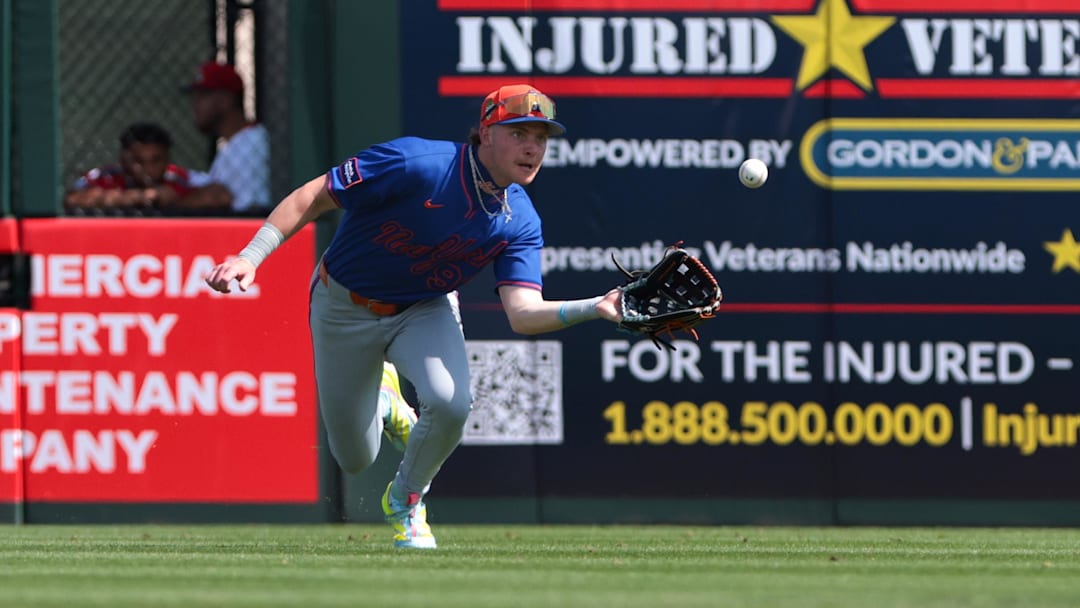 Feb 27, 2026; Jupiter, Florida, USA; New York Mets right fielder Carson Benge (93) makes a diving catch to retire St. Louis Cardinals left fielder Nelson Velázquez (not pictured) during the second inning at Roger Dean Chevrolet Stadium. Mandatory Credit: Sam Navarro-Imagn Images