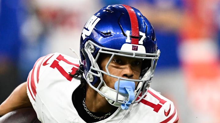 Nov 23, 2025; Detroit, Michigan, USA; New York Giants wide receiver Wan'Dale Robinson (17) runs upfield after catching a swing pass in the second quarter against the Detroit Lions at Ford Field. Mandatory Credit: Lon Horwedel-Imagn Images