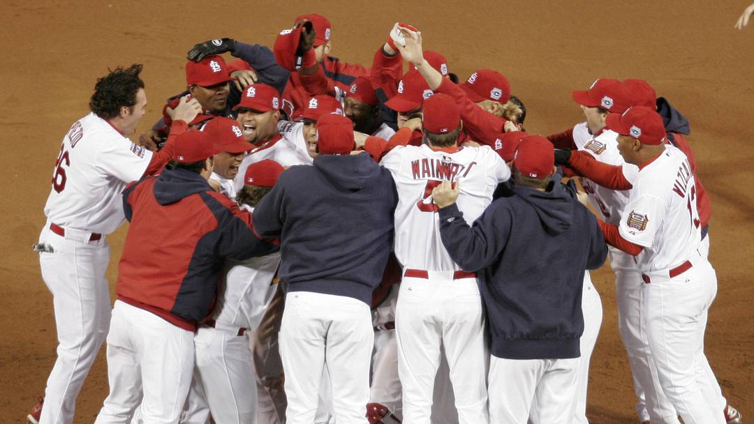 Oct 27, 2006; St. Louis, MO, USA; St. Louis Cardinals players celebrate after defeating the Detroit Tigers 4-2 during game 5 of the World Series to win the series 4 games to 1 at Busch Stadium in St. Louis, Missouri. Mandatory Credit: Jason Parkhurst-Imagn Images Copyright © 2006 Jason Parkhurst