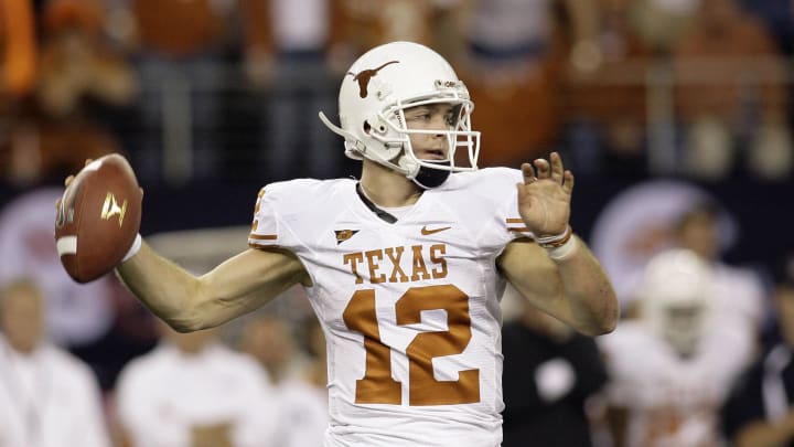 Dec 5, 2009; Arlington, TX, USA; Texas Longhorns quarterback Colt McCoy (12) throws a pass against the Nebraska Cornhuskers in the fourth quarter of the 2009 Big 12 championship game at Cowboys Stadium. Texas defeated Nebraska 13-12. Mandatory Credit: Brett Davis-USA TODAY Sports