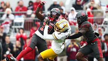 Nov 22, 2025; Norman, Oklahoma, USA; Oklahoma Sooners defensive back Reggie Powers III (13) is called for targeting on Missouri Tigers wide receiver Kevin Coleman Jr. (3) and is ejected during the game at Gaylord Family-Oklahoma Memorial Stadium. Mandatory Credit: Kevin Jairaj-Imagn Images