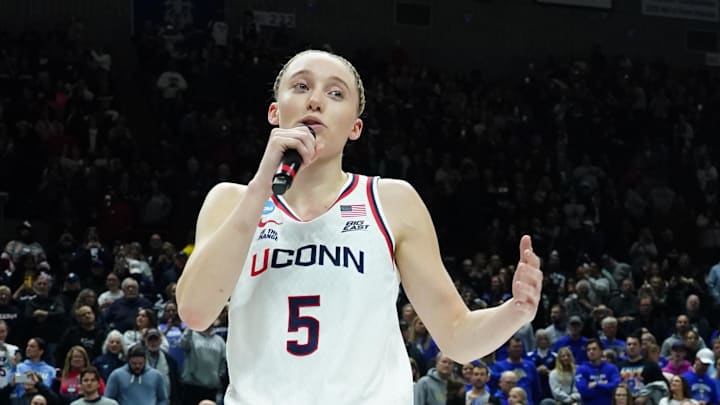 Bueckers speaks to the crowd. 