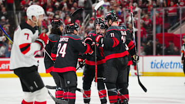 Carolina Hurricanes center Seth Jarvis (24) celebrates his empty net goal: James Guillory-Imagn Images