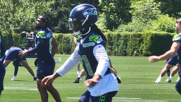 Seattle Seahawks receiver Laviska Shenault warms up prior to the start of mandatory minicamp.