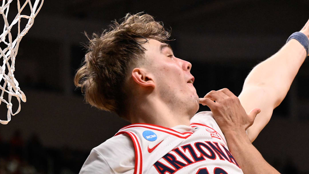 Mar 28, 2026; San Jose, CA, USA; Purdue Boilermakers forward Trey Kaufman-Renn (4) shoots the ball defended by Arizona Wildcats center Motiejus Krivas (13) in the second half during an Elite Eight game of the West Regional of the men's 2026 NCAA Tournament at SAP Center. Mandatory Credit: Eakin Howard-Imagn Images