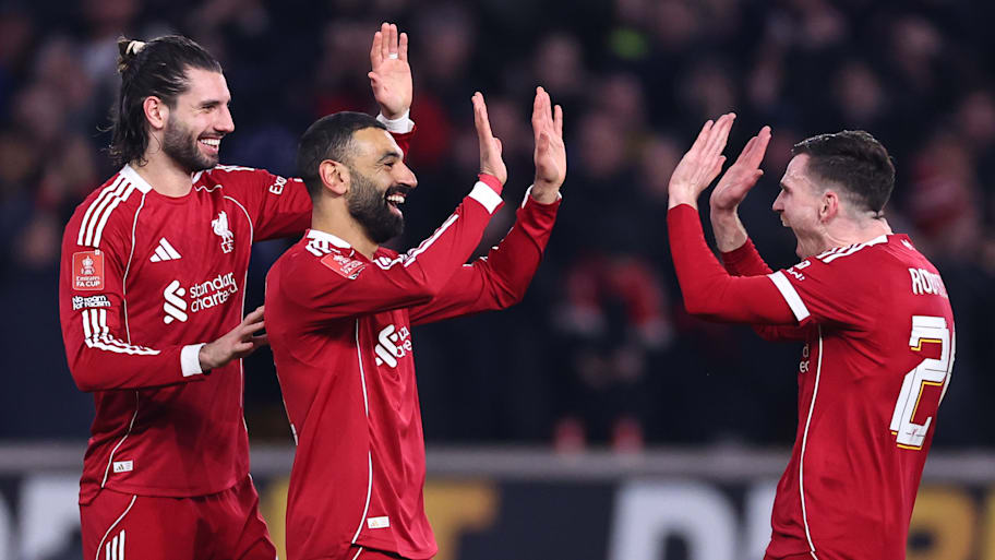 Liverpool players celebrating. 