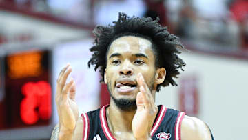Nov 6, 2024; Bloomington, Indiana, USA; SIU Edwardsville Cougars guard Desmond Polk (2) celebrates after a play during the first half against the Indiana Hoosiers at Simon Skjodt Assembly Hall. Mandatory Credit: Robert Goddin-Imagn Images