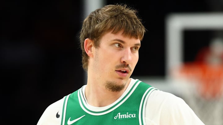 Feb 24, 2026; Phoenix, Arizona, USA; Boston Celtics guard Baylor Scheierman (55) against the Phoenix Suns at Mortgage Matchup Center. Mandatory Credit: Mark J. Rebilas-Imagn Images