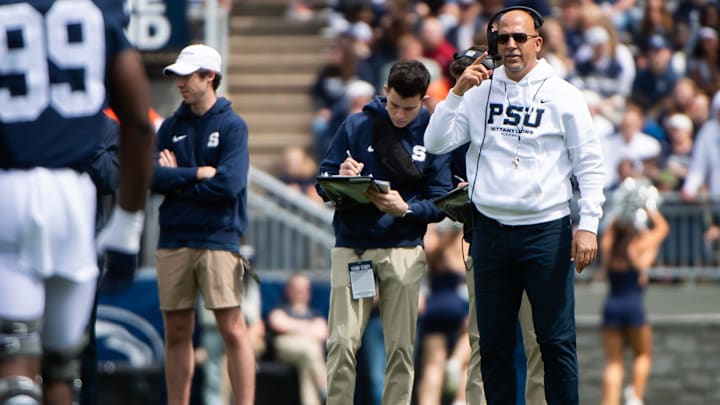 Penn State football coach James Franklin watches the action during the Blue-White Game at Beaver Stadium. Penn State football coach James Franklin watches the action during the Blue-White Game at Beaver Stadium.