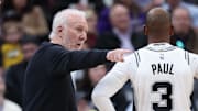 Oct 31, 2024; Salt Lake City, Utah, USA; San Antonio Spurs head coach Gregg Popovich speaks with guard Chris Paul (3) during the second quarter in the game against the Utah Jazz at Delta Center. Mandatory Credit: Rob Gray-Imagn Images
