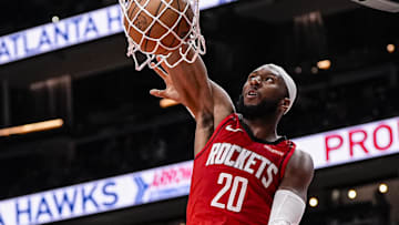 Oct 16, 2025; Atlanta, Georgia, USA; Houston Rockets forward Josh Okogie (20) dunks the ball against the Atlanta Hawks during the second half at State Farm Arena. Mandatory Credit: Dale Zanine-Imagn Images