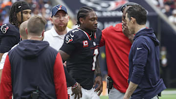Oct 27, 2024; Houston, Texas, USA; Houston Texans wide receiver Stefon Diggs (1) walks off the field after an apparent injury during the third quarter against the Indianapolis Colts at NRG Stadium. Mandatory Credit: Troy Taormina-Imagn Images