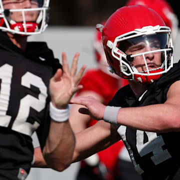 Georgia quarterback Gunner Stockton (14) looks to throw the ball during spring practice in Athens, Ga., on Thursday, March 14, 2024.