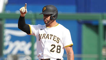 Apr 20, 2025; Pittsburgh, Pennsylvania, USA;  Pittsburgh Pirates leftfielder Tommy Pham (28) reacts with a double against the Cleveland Guardians during the ninth inning at PNC Park. Mandatory Credit: Charles LeClaire-Imagn Images