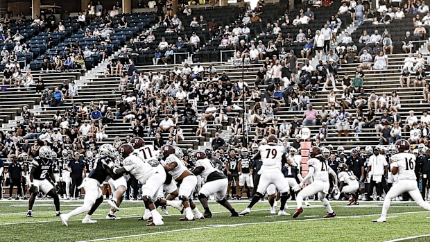 Texas Southern quarterback Jace Wilson steps back to pass the football against the Rice Owls.