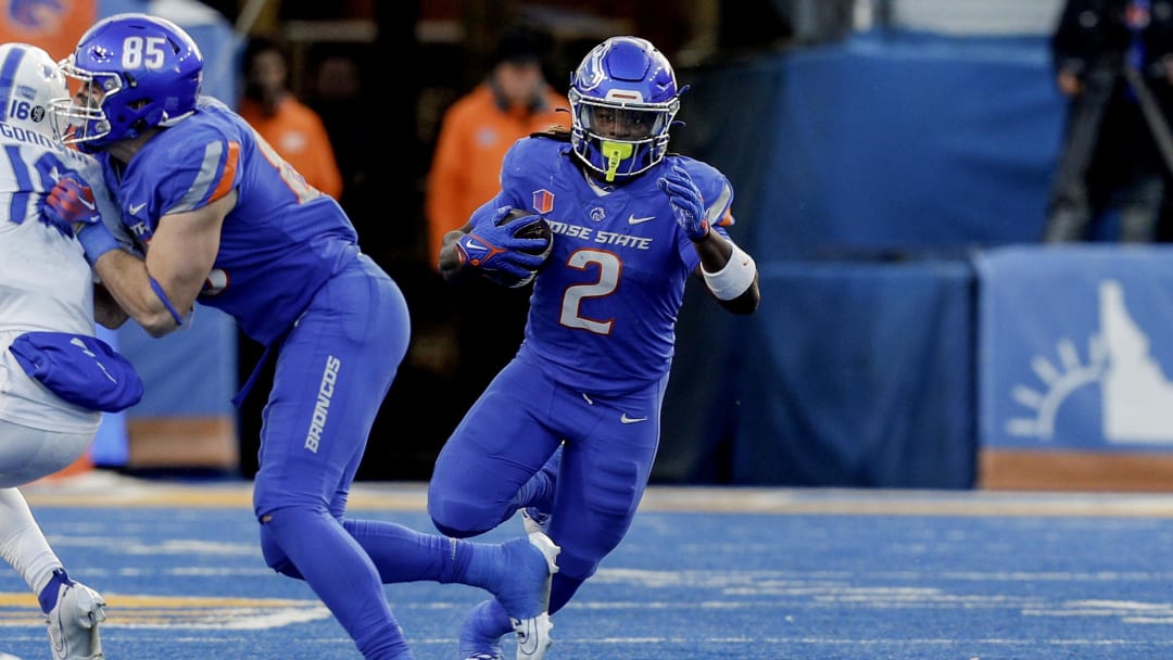 Nov 24, 2023; Boise, Idaho, USA;  Boise State Broncos running back Ashton Jeanty (2) carries the ball during the second half against the Air Force Falcons at Albertsons Stadium. Boise State defeats Air Force 27-19. Mandatory Credit: Brian Losness-USA TODAY Sports


