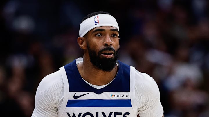 Apr 27, 2026; Denver, Colorado, USA; Minnesota Timberwolves guard Mike Conley (10) dribbles the ball up court in the first quarter against the Denver Nuggets during game five of the first round of the 2026 NBA Playoffs at Ball Arena. Mandatory Credit: Isaiah J. Downing-Imagn Images