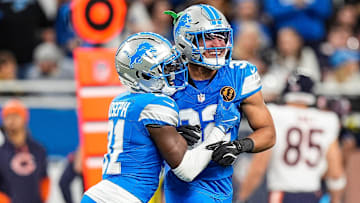 Detroit Lions safety Kerby Joseph (31), left, and safety Brian Branch (32) celebrate a play against Chicago Bears 