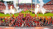 Sep 27, 2025; Raleigh, North Carolina, USA;  The North Carolina State Wolfpack takes to the field before the first half of the game against Virginia Tech Hokies at Carter-Finley Stadium. Mandatory Credit: Jaylynn Nash-Imagn Images