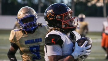 Cocoa's Jayvan Boggs makes the catch for second quarter touchdown during a game with Mainland at Daytona Stadium in Daytona Beach, Friday, Aug. 30, 2024.