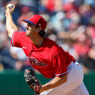 Mar 7, 2023; Clearwater, Florida, USA;  Philadelphia Phillies pitcher Griff McGarry (71) throws a pitch against the Tampa Bay Rays in the fifth inning during spring training at BayCare Ballpark. 
